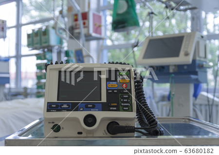 Defibrillator,  on background medical ventilator 63680182