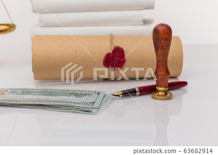 Notary's public pen and stamp on testament and last will. Notary public tools Notary's public pen and stamp on testament and last will. Notary public tools 63682914