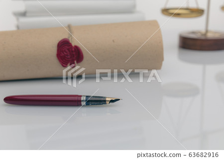 Notary public wax stamper and wax seal on document Notary public wax stamper and wax seal on document 63682916