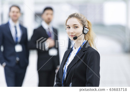 operator wearing a headset 63683718