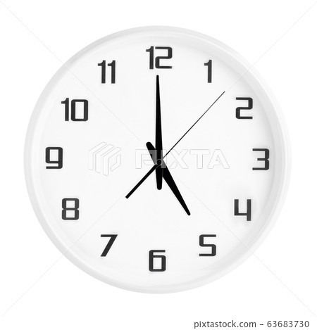 White round office clock showing five o'clock isolated on white background. 63683730