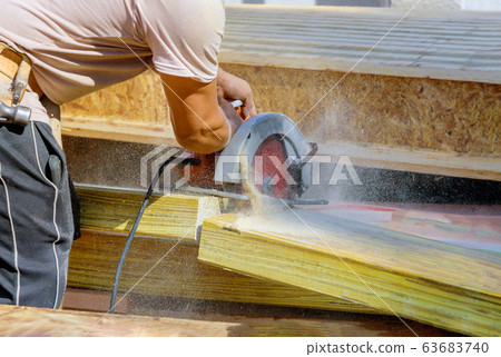 Circular Saw. Carpenter Using Circular Saw for 63683740