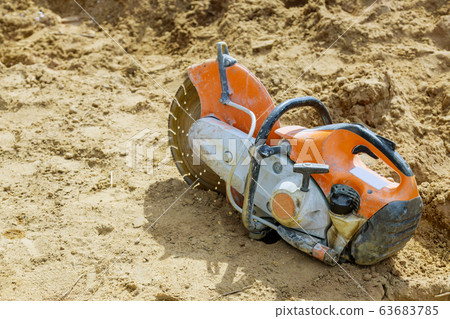 Concrete cutting with saw blade at construction 63683785