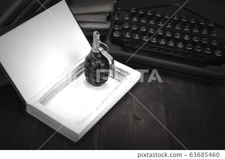hand grenade hidden in a book 63685460