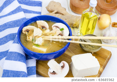 Vegetarian miso soup with tofu and mushrooms. Vegetarian miso soup with tofu and mushrooms. 63685562
