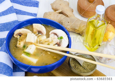 Vegetarian miso soup with tofu and mushrooms. 63685563