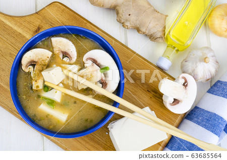 Vegetarian miso soup with tofu and mushrooms. Vegetarian miso soup with tofu and mushrooms. 63685564