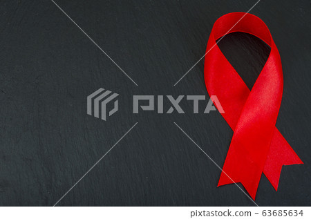 World AIDS Day, red ribbon, symbol. 63685634