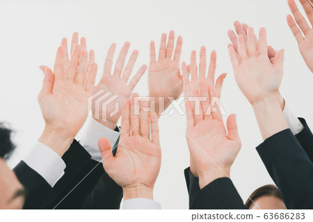 Business person raising hand 63686283