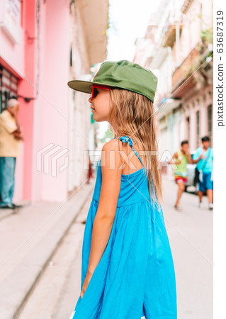 Tourist girl in popular area in Havana, Cuba. Tourist girl in popular area in Havana, Cuba. 63687319