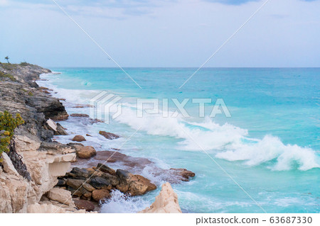 Sea shore and stones close background in Cuba Sea shore and stones close background in Cuba 63687330