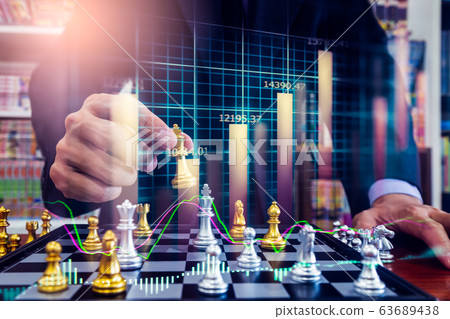 Chess game on chess board on stock market or forex 63689438
