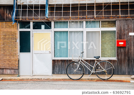 Old wooden house and bicycle in Shodoshima, Shikoku, Japan Old wooden house and bicycle in Shodoshima, Shikoku, Japan 63692791