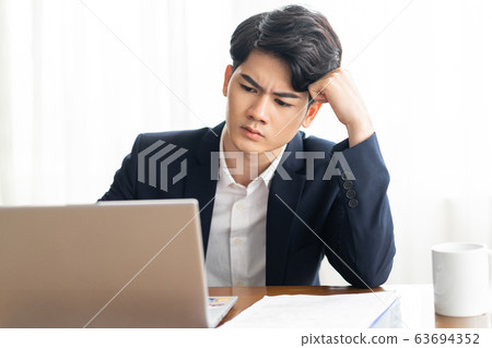 Business man working in office 63694352