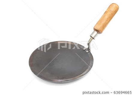 Indian iron tawa or pan to prepare chapati, roti Indian iron tawa or pan to prepare chapati, roti 63694665