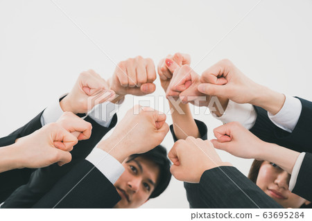 Business team fighting Business team fighting 63695284