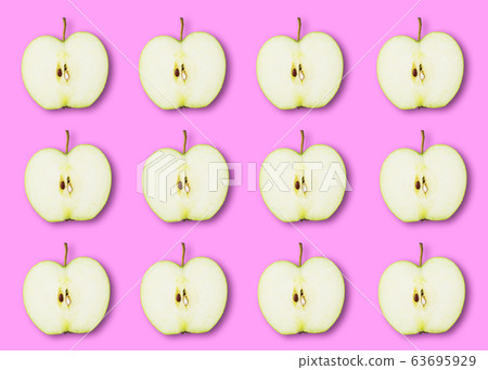 Slices of ripe green Apple on a pink background. Pattern Wallpaper Flat lay top view. 63695929