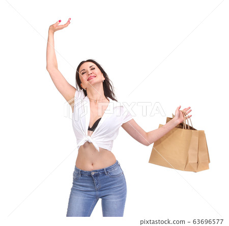 Brunette woman with shopping bags 63696577