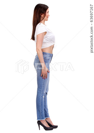 Pretty woman in pants isolated Pretty woman in pants isolated 63697167