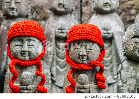 Stone Jizo buddha statue at Hasedera temple in Kamakura, Japan 63698108