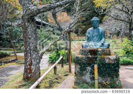 Tokei-ji Temple buddha statue at autumn in Kamakura, Japan 63698519