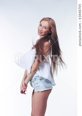 young woman in blue short young woman in blue short 63698705