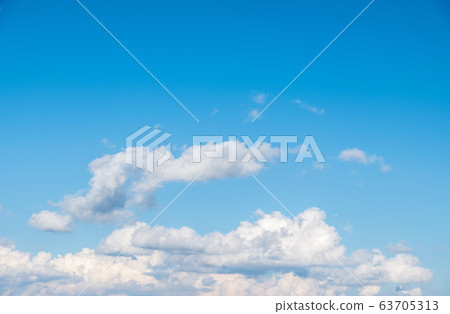 Fluffy cloud on the clear blue sky with the copy 63705313