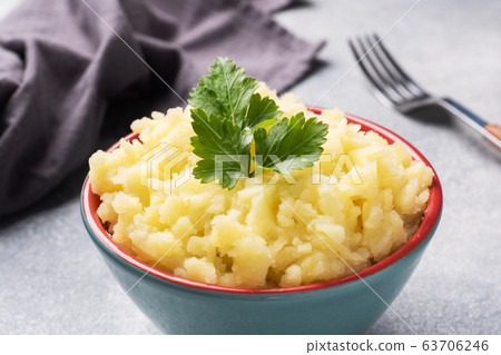 Homemade cream mashed potatoes in a dish with Homemade cream mashed potatoes in a dish with 63706246