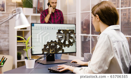 Female engineer working on a 3d design from home 63706385