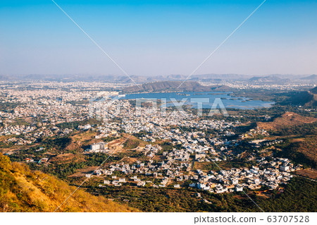 Pichola lake and old town from Monsoon Palace in Udaipur, India 63707528