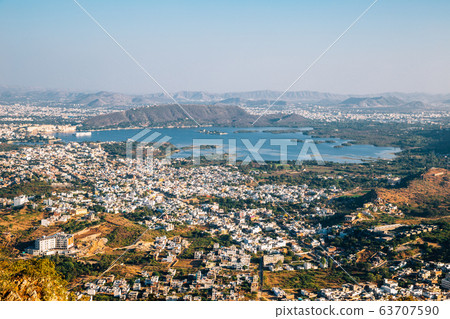 Pichola Lake and old town panoramic view from Monsoon Palace in Udaipur, India 63707590