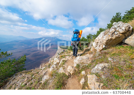 The tourist in mountain 63708448