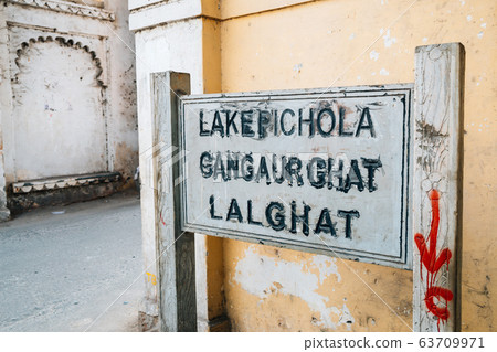 Lake Pichola, Gangaur Ghat, Lal Ghat sign in Udaipur, India 63709971