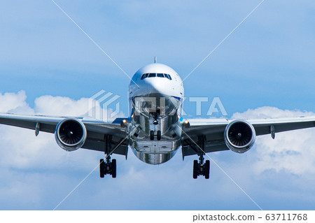 Airplane approaching landing Airplane approaching landing 63711768