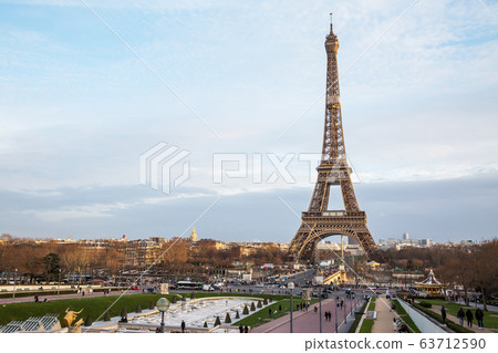 Street with view on the famous paris eiffel tower Street with view on the famous paris eiffel tower 63712590