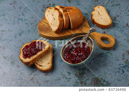 Bread slices with raspberry jam,easy healthy snack,top view 63716498
