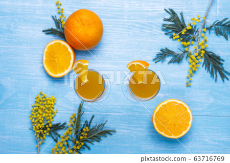 Homemade Refreshing Orange Mimosa Cocktails with Champaigne 63716769