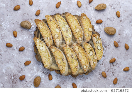 Italian tuscan traditional cookies cantuccini with almonds on light background,top view 63716872