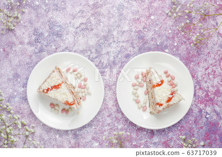 Italian tuscan traditional cookies cantuccini with almonds ,a cup of coffee on light background,top view Italian tuscan traditional cookies cantuccini with almonds ,a cup of coffee on light background,top view 63717039