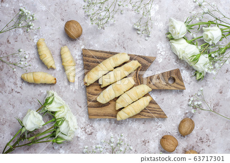Traditional Azerbaijan holiday Novruz cookies mutaki on white plate on light background Traditional Azerbaijan holiday Novruz cookies mutaki on white plate on light background 63717301
