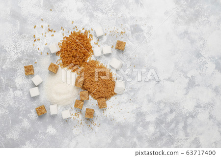 Various types of sugar, brown sugar and white on concrete background,top view 63717400
