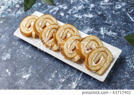 Quince jam cake roll with fresh organic quinces Quince jam cake roll with fresh organic quinces 63717402