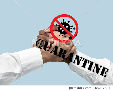 Human hands shaking, avoid greeting while coronavirus epidemic - concept of spreading of virus Human hands shaking, avoid greeting while coronavirus epidemic - concept of spreading of virus 63717895