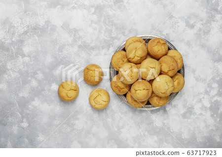 Healthy homemade cookies on concrete background,top view Healthy homemade cookies on concrete background,top view 63717923