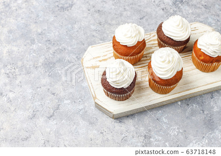 Cupcake baking background with kitchen utensils. Cupcake baking background with kitchen utensils. 63718148