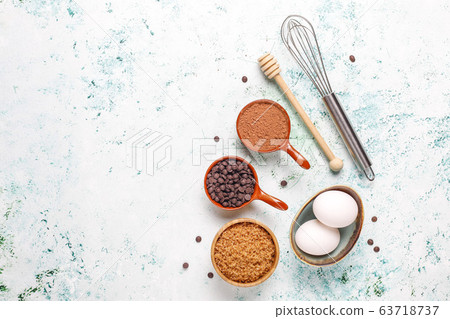 Cupcake baking background with kitchen utensils. Cupcake baking background with kitchen utensils. 63718737