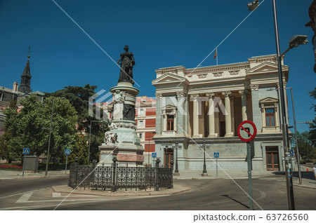 Monument on street in front of building in Madrid Monument on street in front of building in Madrid 63726560