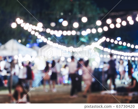 Festival Event Party outdoor Blur crowd people holiday background Festival Event Party outdoor Blur crowd people holiday background 63730420