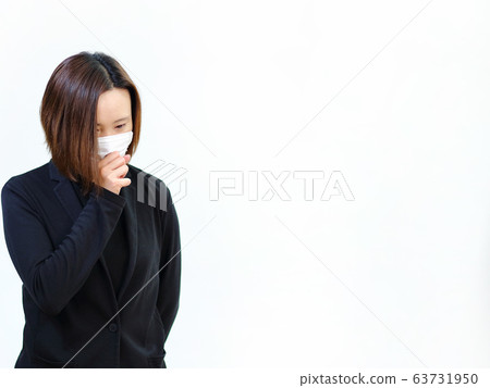 woman wearing a mask 63731950