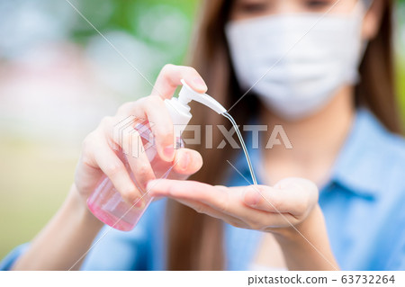 Asian woman with facial mask Asian woman with facial mask 63732264
